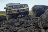 The ute sits on a pile of rubble on Easter Island.