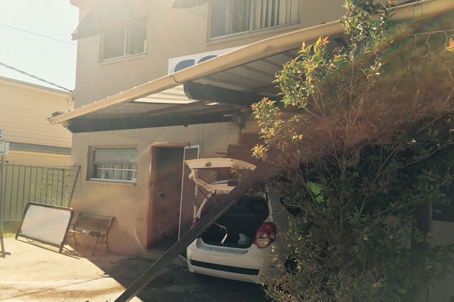 Car has ploughed into a shop front