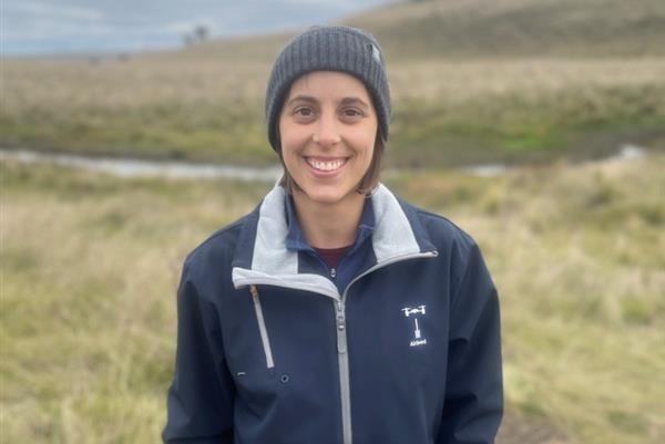 Photo of a woman smiling.