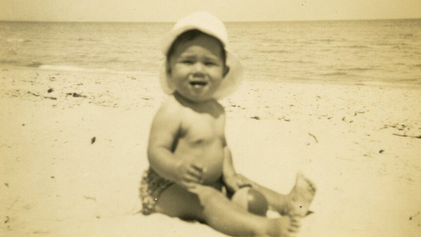 Maurice Cole on the beach, was adopted soon after birth and grew up in Warrnambool on Victoria's southwest coast.