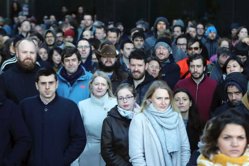 Hundreds of Google workers walk off the job and away from the building to protest