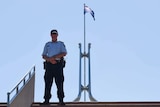 AFP officer outside Parliament House