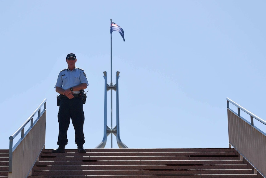 AFP officer outside Parliament House