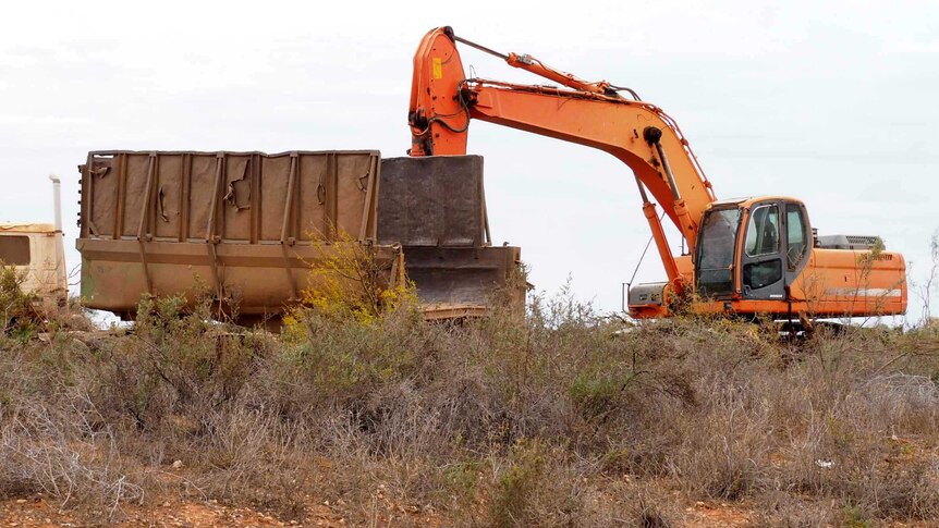 A truck and an orange crane on a property near Trentham Cliffs in south-west NSW.