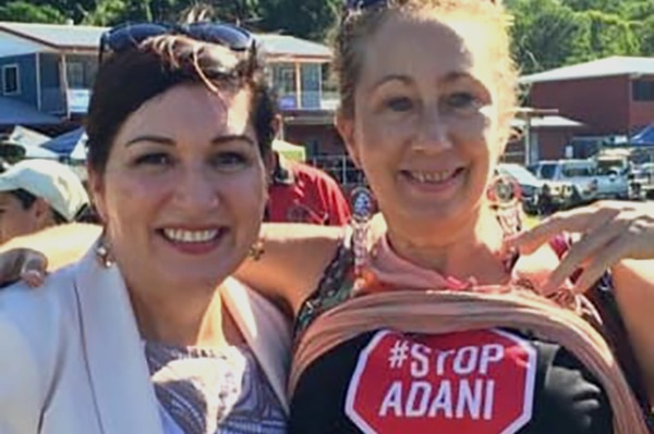 Queensland Environment Minister Leeanne Enoch with an anti-Adani campaigner on June 15, 2019.