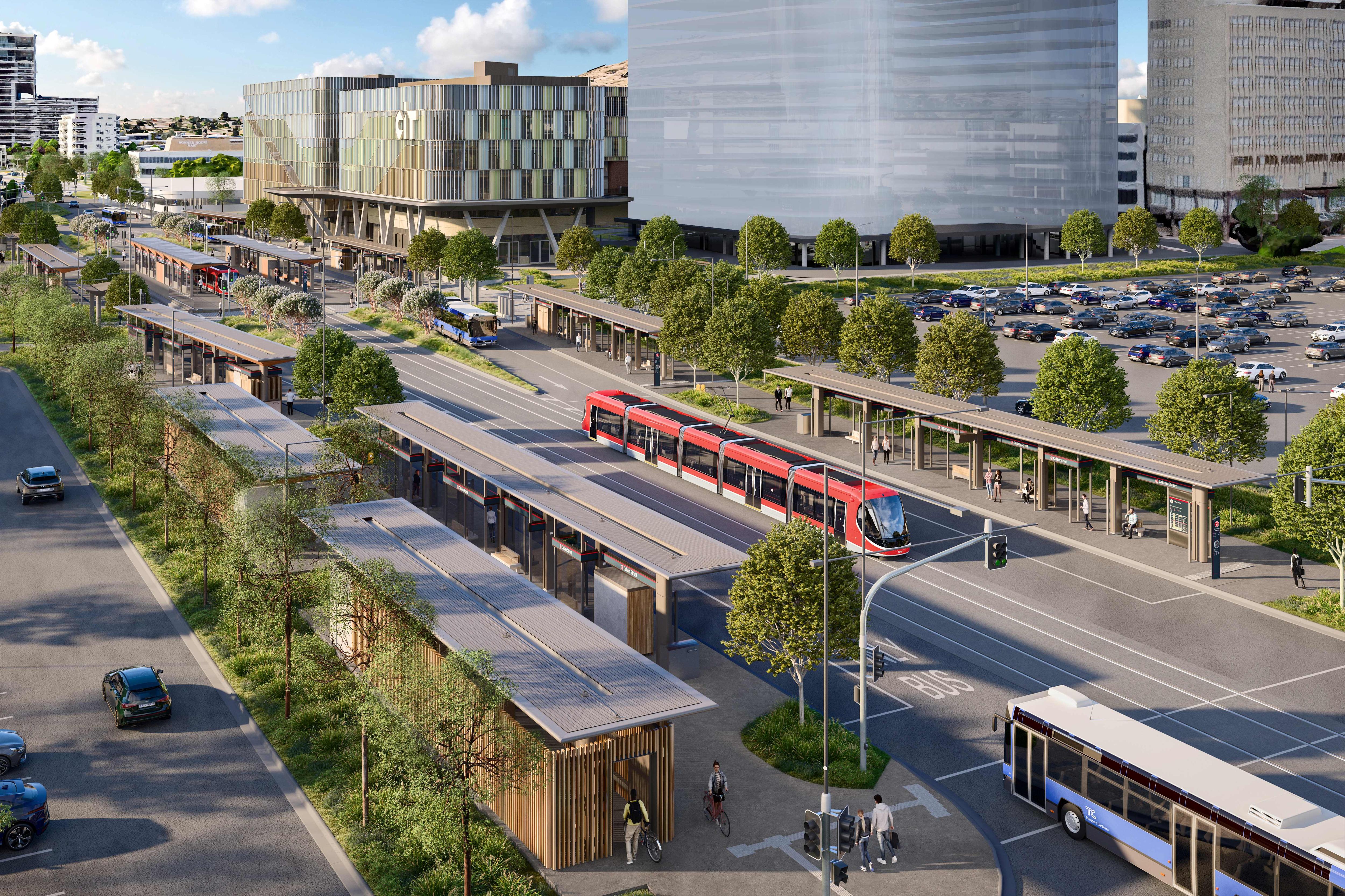 A picture of a light rail vehicle stopped at a transport interchange outside a CIT building.