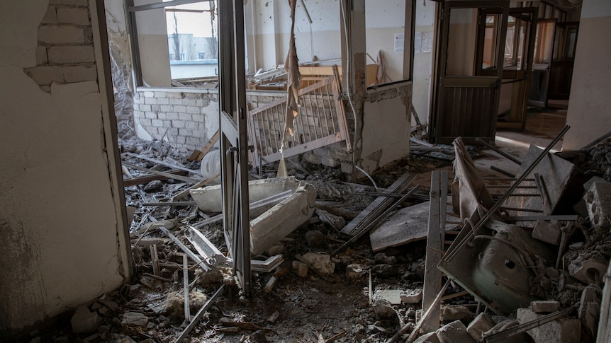 An indoor setting is filled with fresh rubble