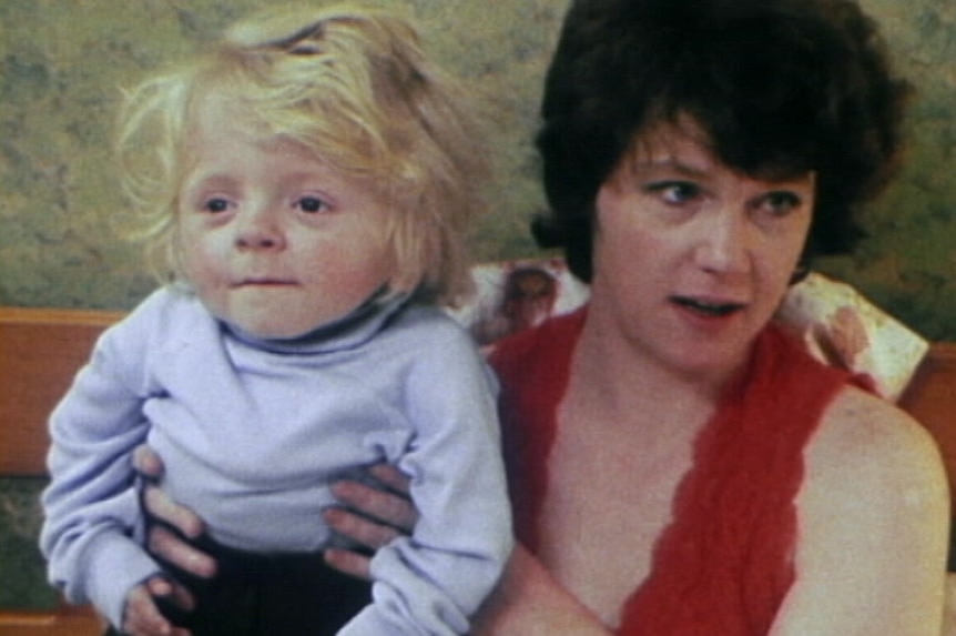 Quentin Kenihan as a boy with his mother.