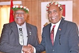 Fijian prime minister Sitiveni Rabuka besides Kiribati pm Taneti Maamau in flower headdress 