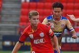 Riley McGree playing for Adelaide United