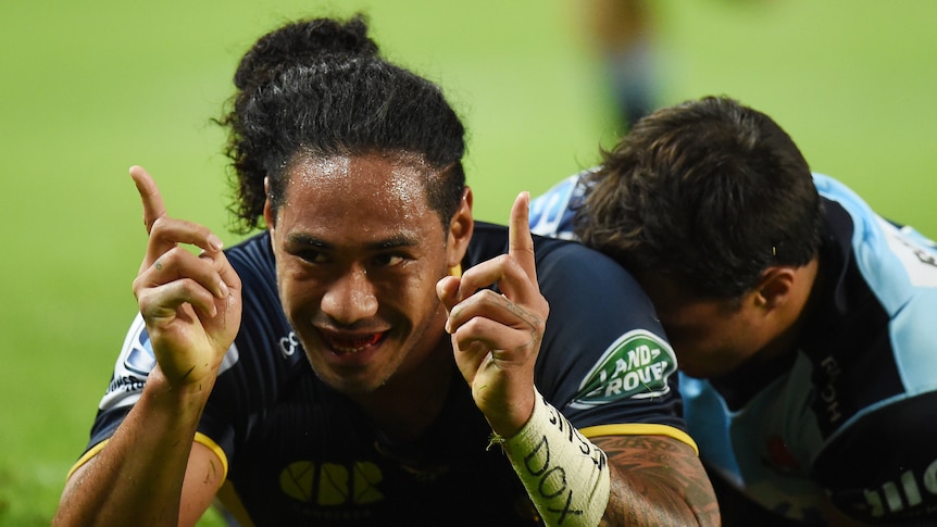 Joe Tomane of the Brumbies celebrates a try