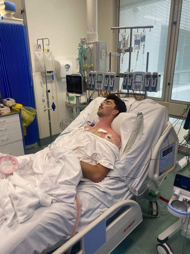 Cameron in his hospital bed after receiving his new heart.