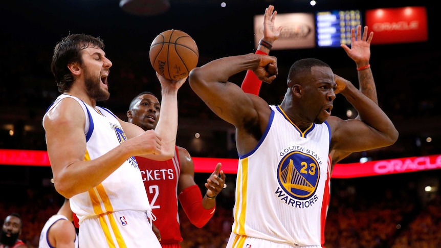 Conference title ... Andrew Bogut (L) celebrates during the Warriors' win over the Rockets