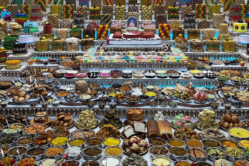 A wide spread of sweet delicacies covers the table