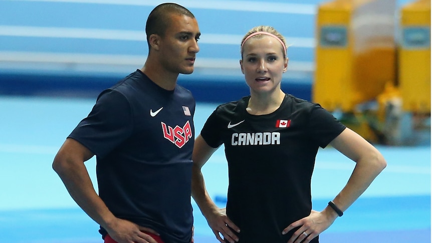 American Ashton Eaton and Canada's Brianne Theisen-Eaton at 2014 World Indoor Athletics titles.