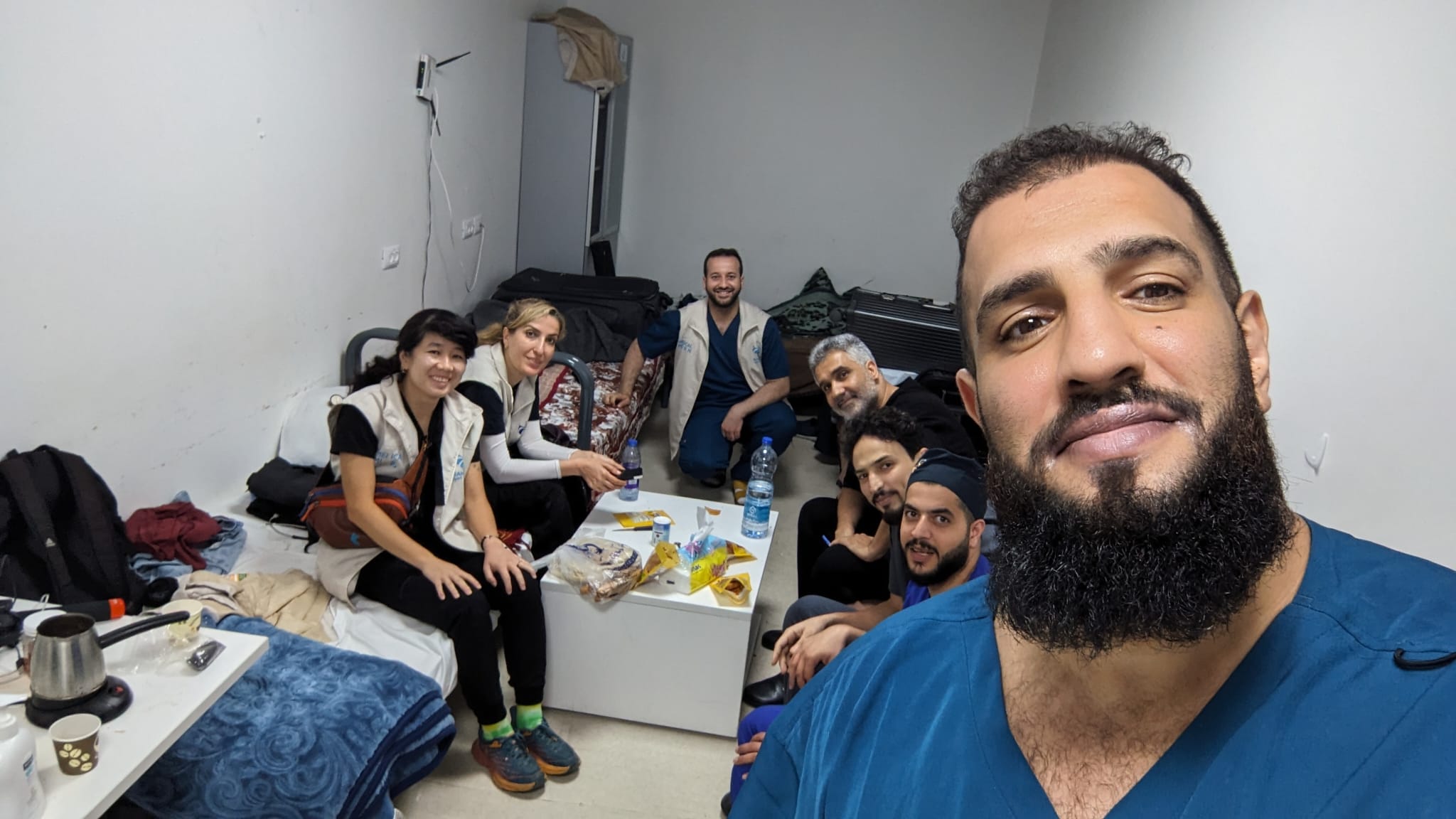 Dr Mo selfie with other workers