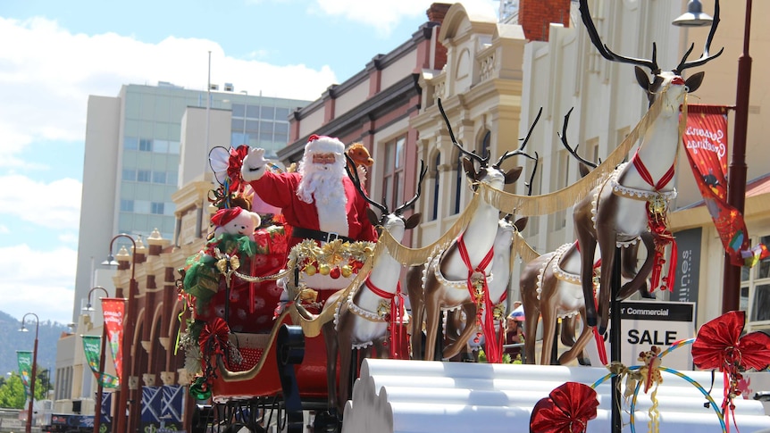 Santa riding high in the Hobart Christmas pageant.