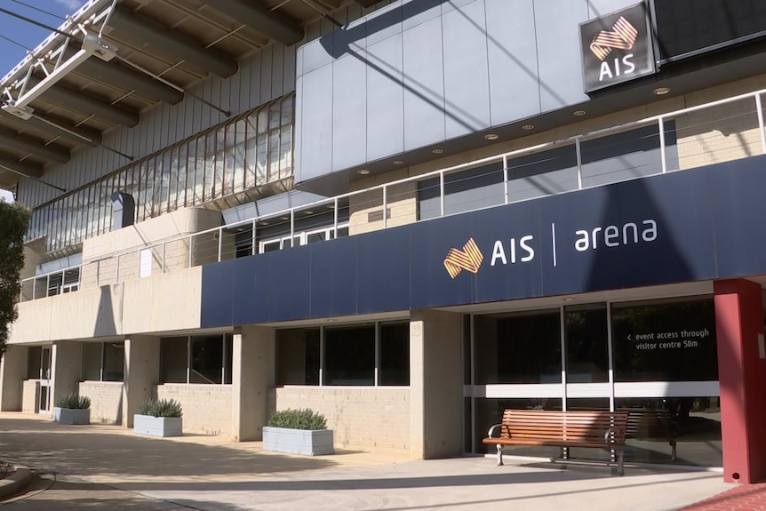 A building with a sign that reads "AIS Arena".