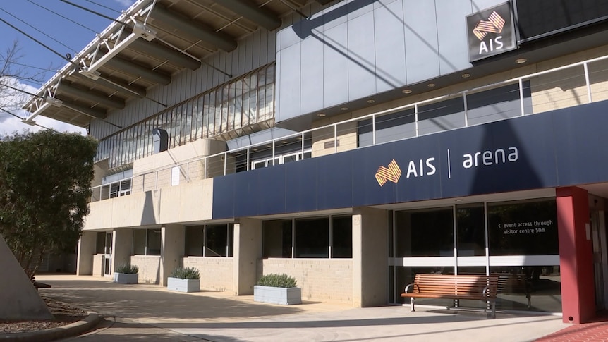 A building with a sign that reads "AIS Arena".