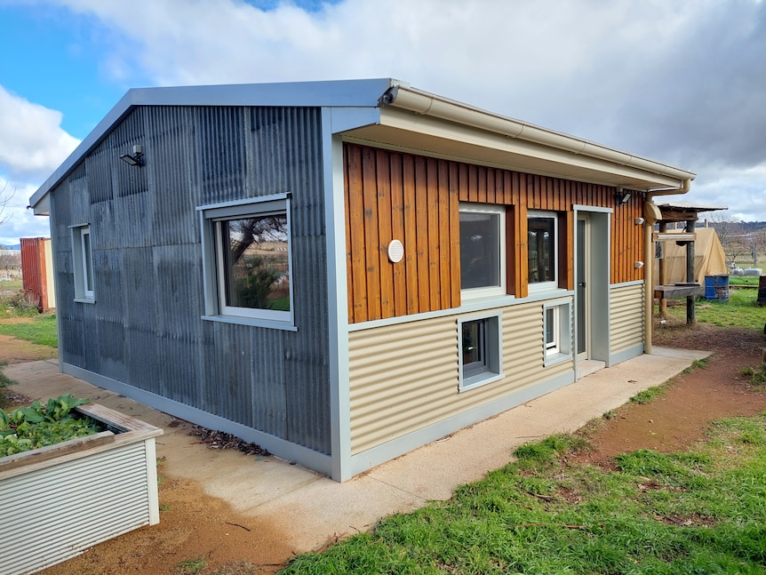 A refurbished shed almost looks like a house from the outside