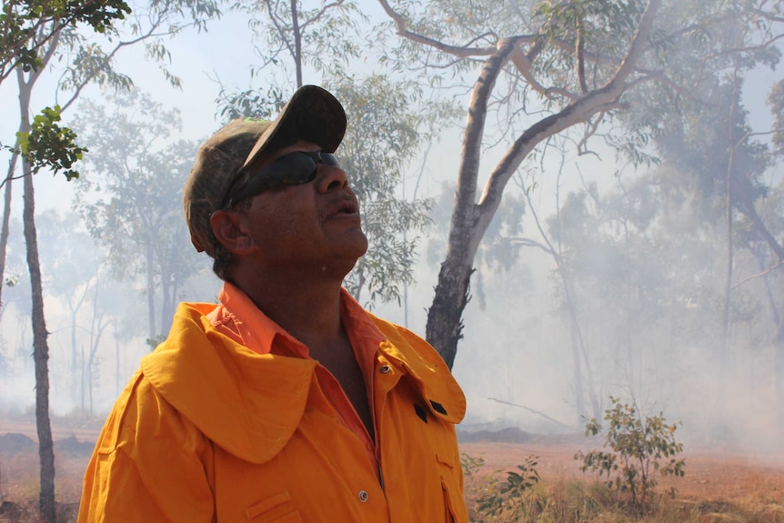 Jigija Fire Lead Instructor Terrence Taylor in the middle of a fire