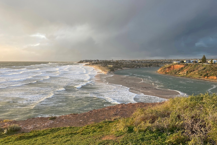 Large waves near the river mouth during a storm