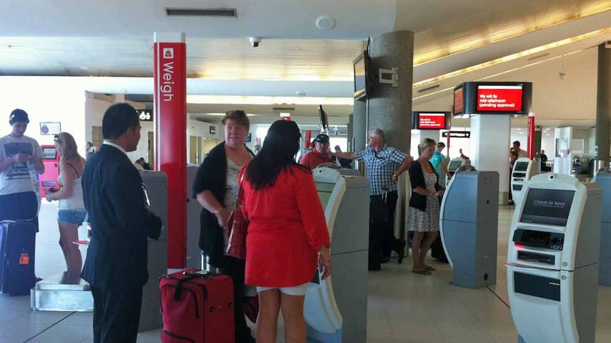 Passengers at Qantas automatic check in, Perth