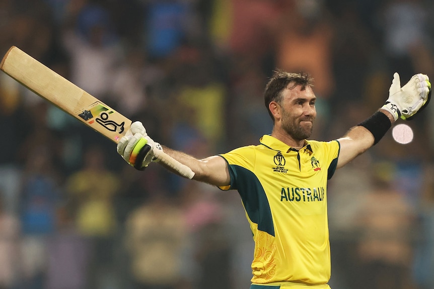 Glenn Maxwell holds out his hands
