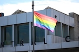 The rainbow pride flag flies over Ulverstone town hall. 