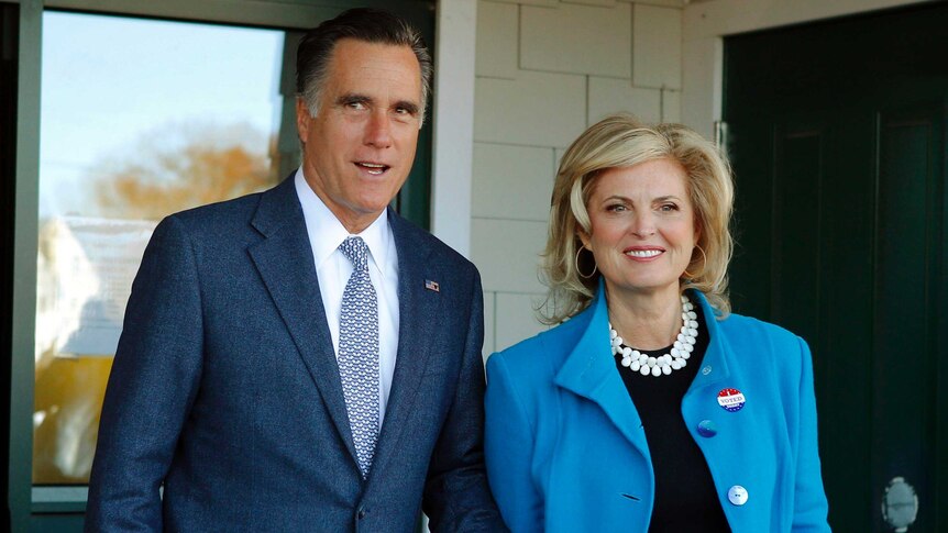 Republican presidential nominee Mitt Romney and his wife Ann walk after voting in Belmont, Massachusetts.