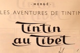 Front page of the comic The adventures of Tintin - Tintin au Tibet signed by the author Herge (R) and the Dalai Lama (R bottom).