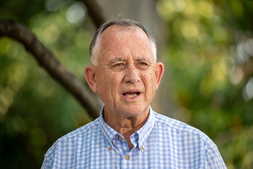 Former Queensland politician John Mickel speaks to media in Brisbane in 2019.