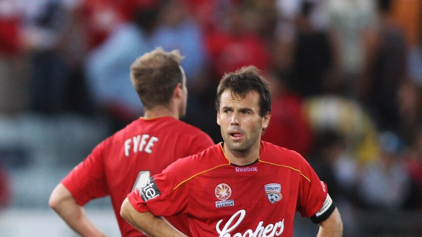Former Reds midfielder Paul Reid has signed for the Melbourne Heart on a short-term deal.