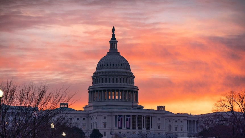 Dawn breaks over the Capitol building in Washington DC