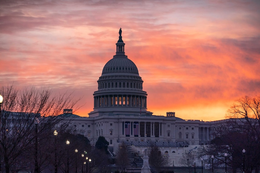 Dawn breaks over the Capitol building in Washington DC