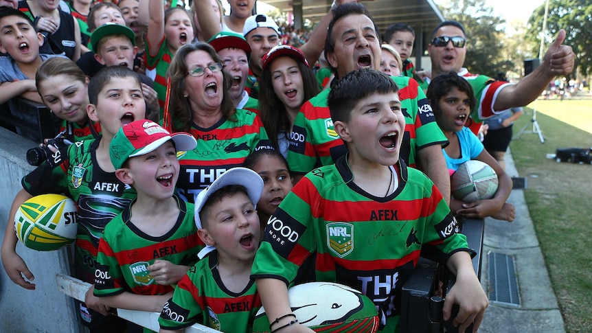 South Sydney fans show their support during a Rabbitohs training session at Redfern Oval.