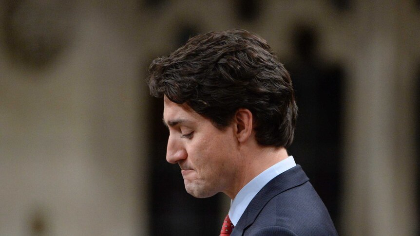 Prime Minister Justin Trudeau pauses in the house of commons in Parliament Hill Ottawa