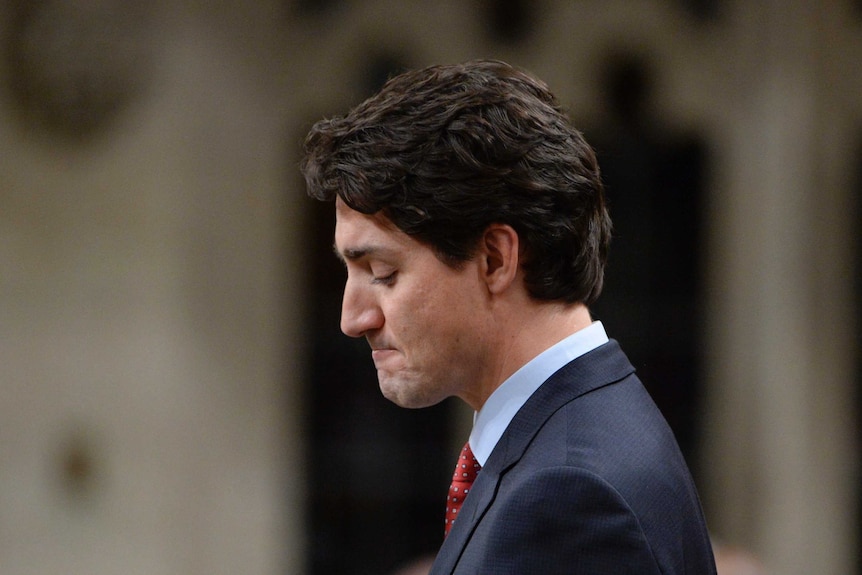 Prime Minister Justin Trudeau pauses in the house of commons in Parliament Hill Ottawa