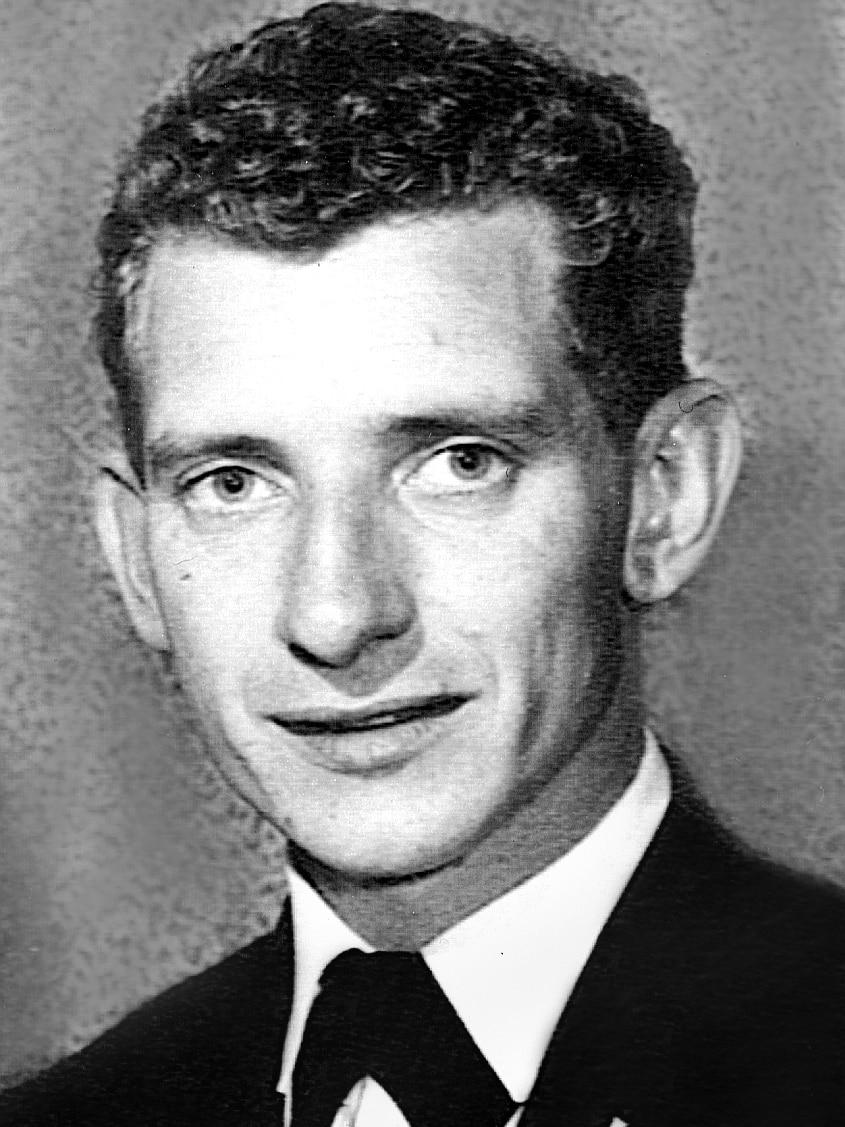 Black and white head shot of John Button in about 1963.
