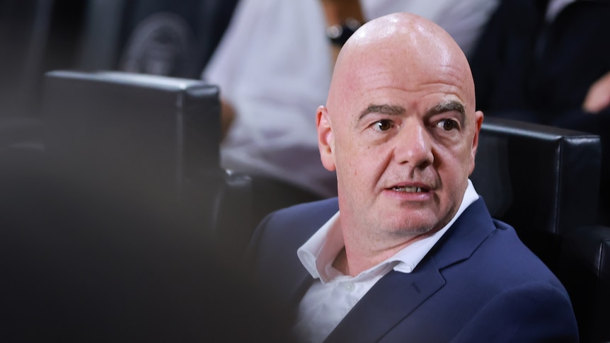 Gianni Infantino looks to one side
