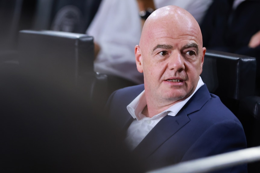 Gianni Infantino looks to one side