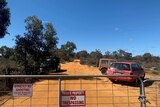 A gate at the Kaniva property where the EPA is investigating an illegal chemical waste dump.