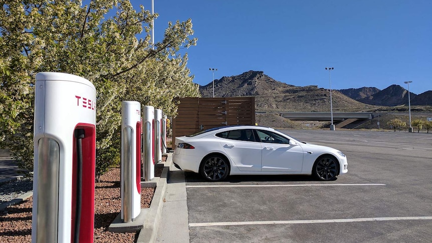 Tesla electric car at a charging station