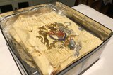 piece of cake from the royal wedding of prince charles and princess diana wrapped in plastic which sold at auction