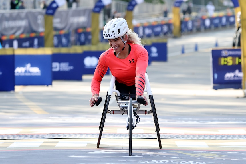 Madison de Rozario smiles in her wheelchair