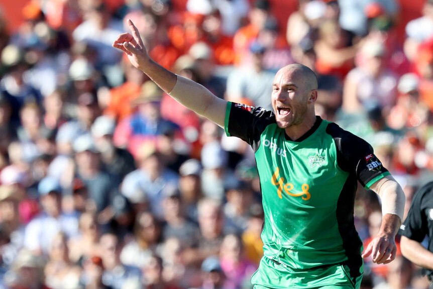 John Hastings points his finger as he celebrates a wicket for the Stars in BBL.