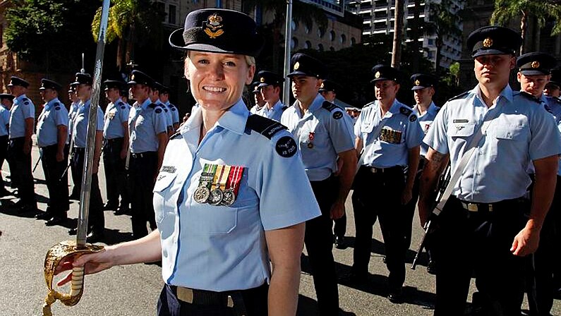No. 1 Flight Commander, Flying Officer Kristina Filippi forms up with her flight ahead of the 2013 Anzac Day march in Brisbane.
