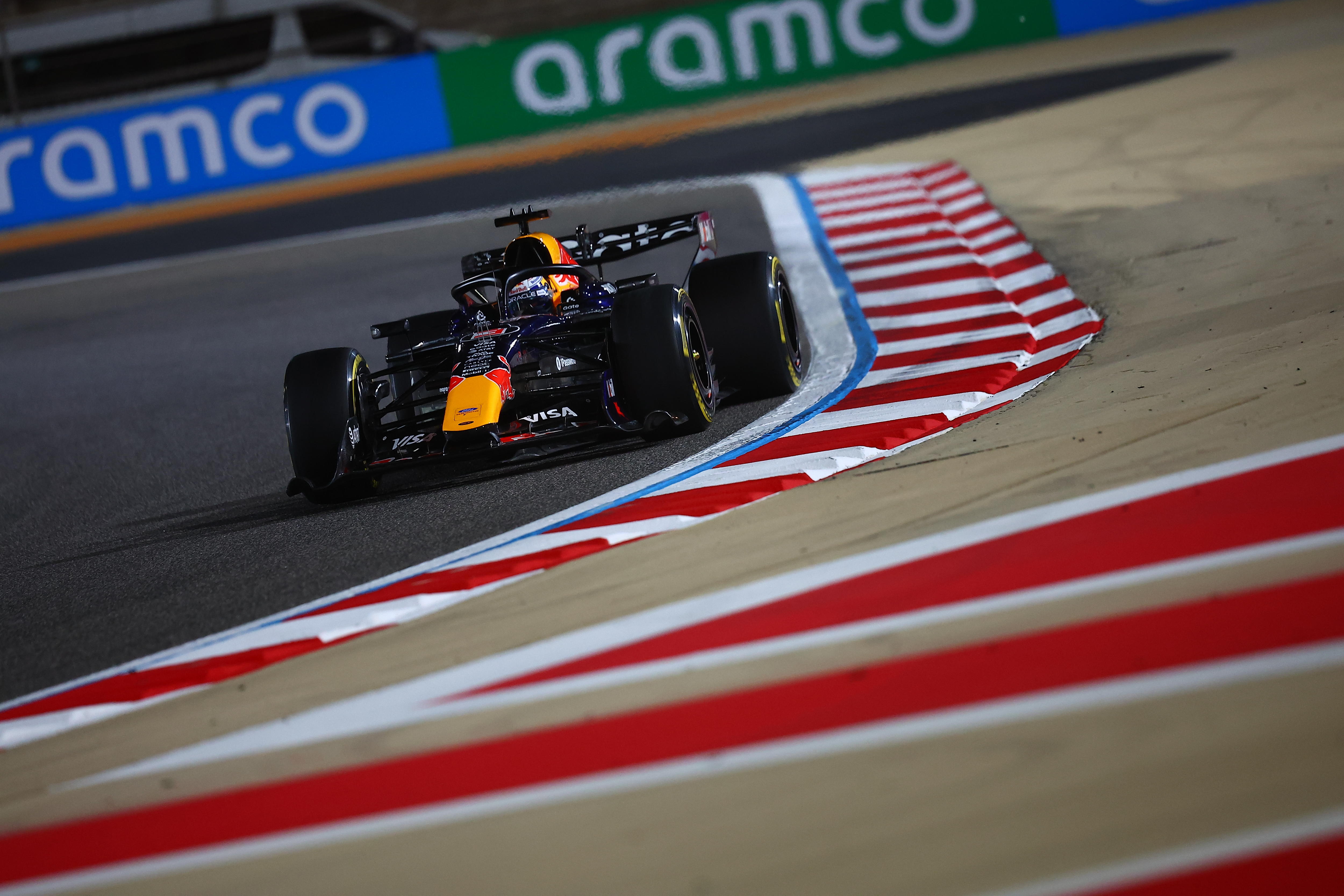 F1 car on track during testing, going around a corner