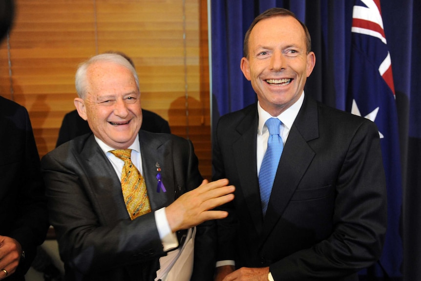 Tony Abbott (right) jokes with Philip Ruddock