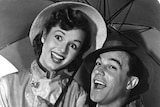 Debbie Reynolds and Gene Kelly in musical film Singin' in the Rain.